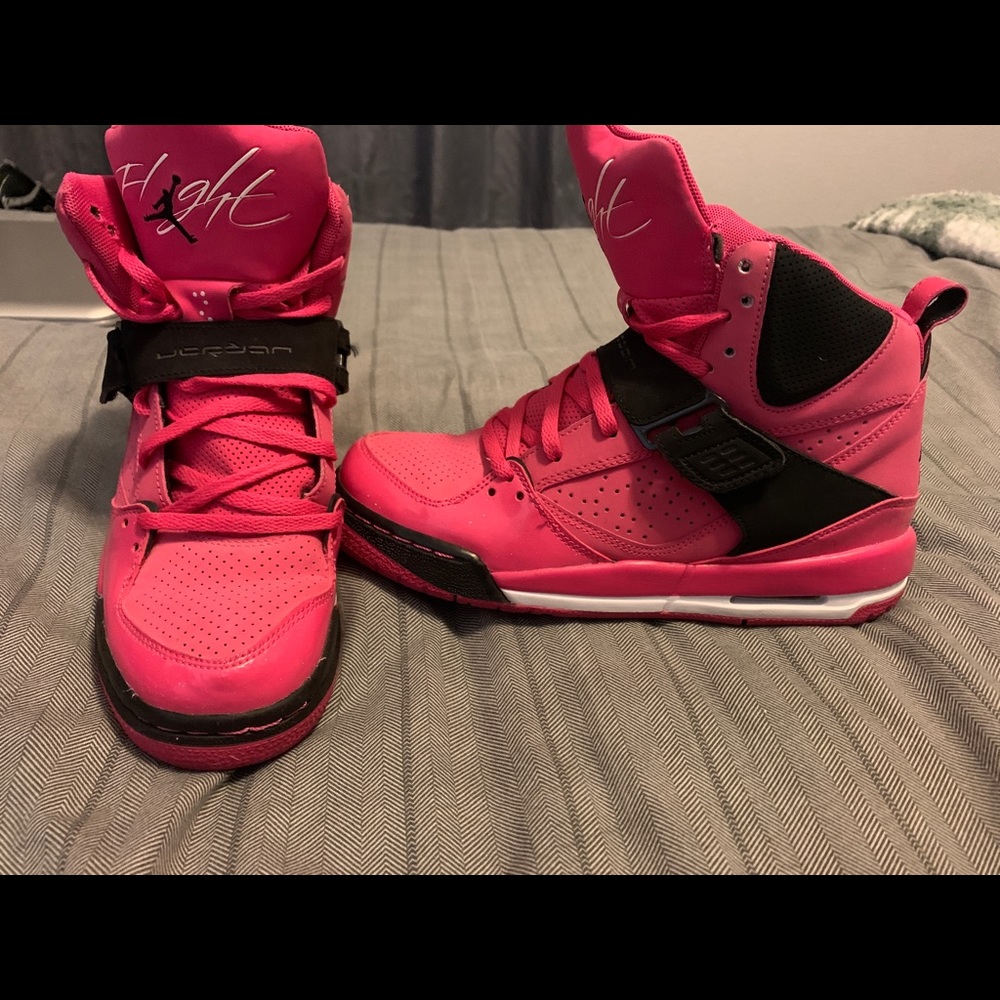 Pink with black Air Jordans Flight